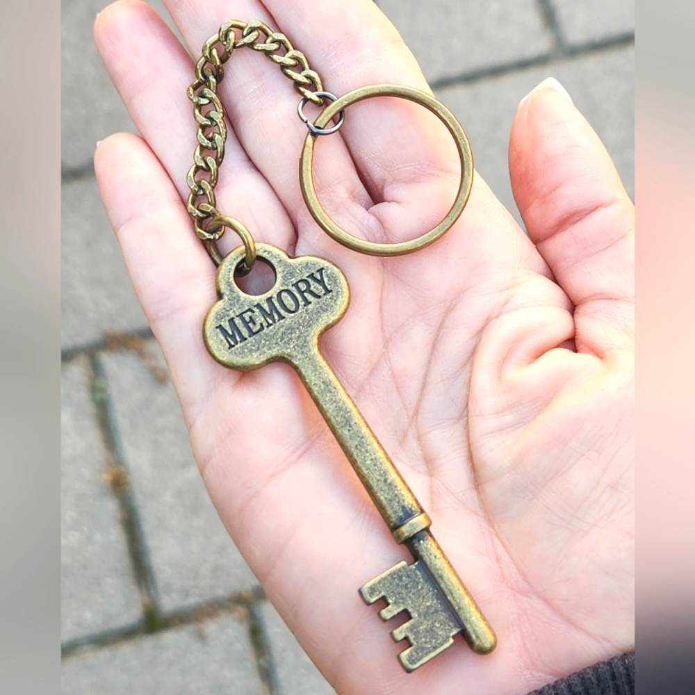 Anthropologie "Key To The Past" Antiqued Brass Keychain